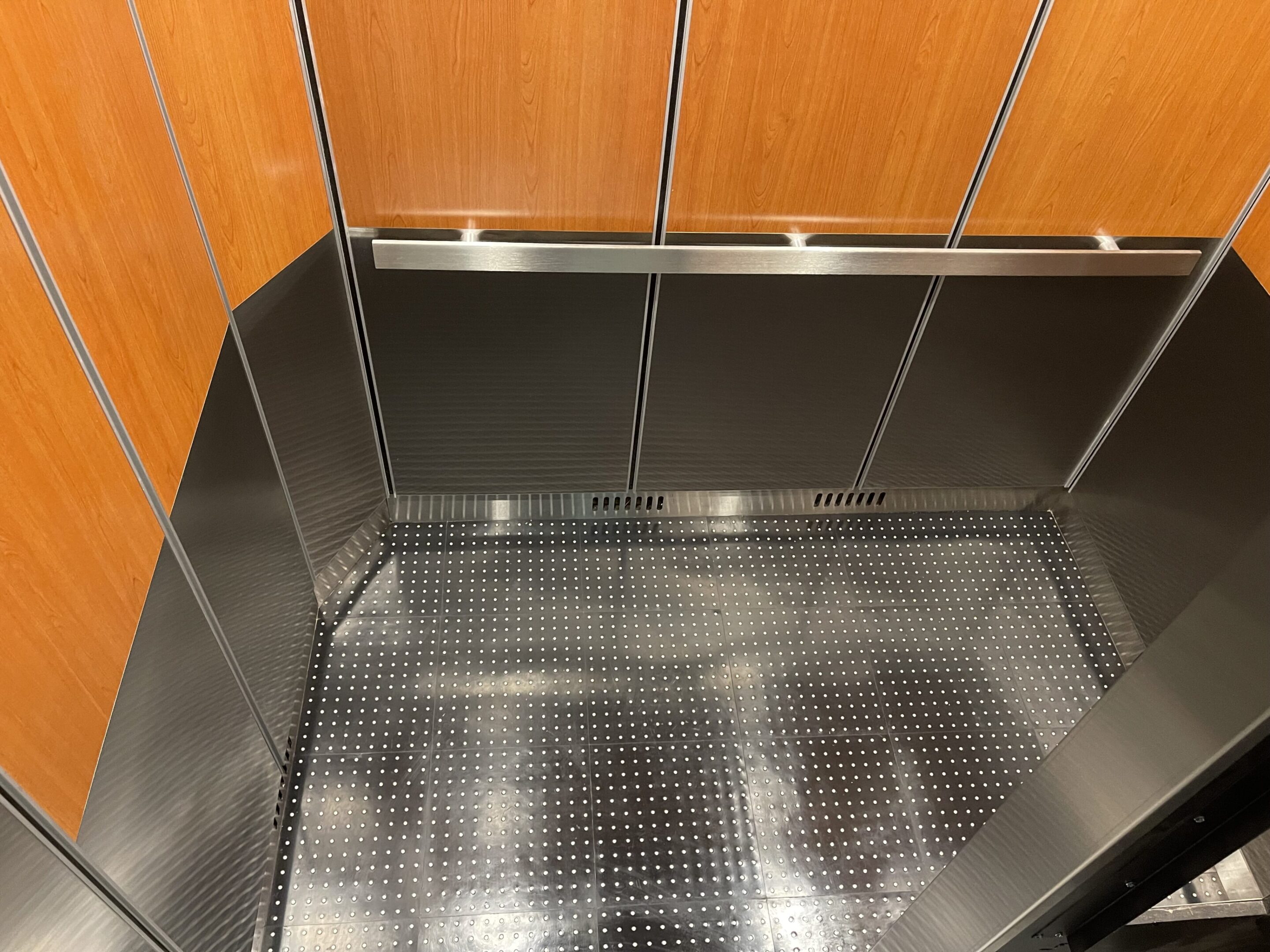 Wild Cherry & Stainless Elevator Cab — Hamilton Heights — 310 Convent Avenue · Hamilton Heights, Manhattan