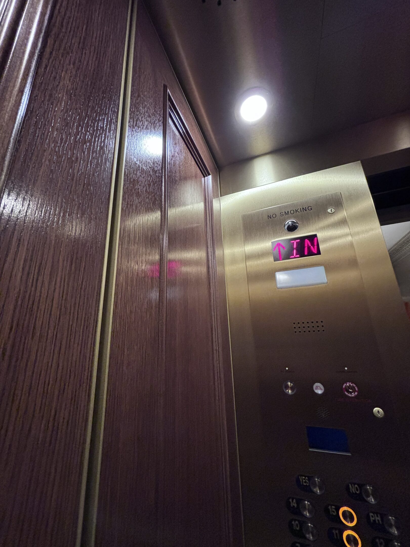 White Rift Oak & Bronze Elevator Cab — Upper West Side — 221 West 82nd Street · Upper West Side, Manhattan