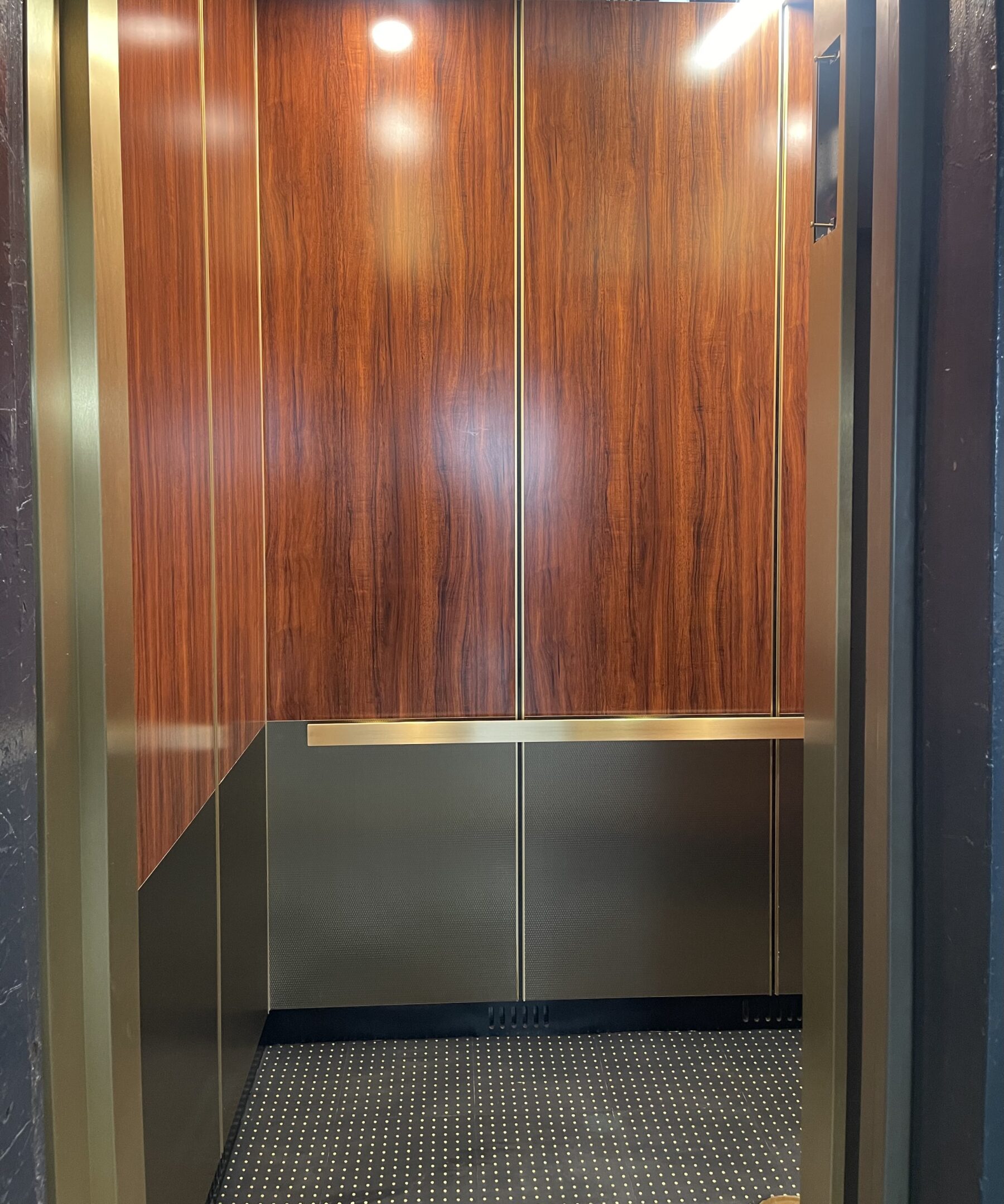 Bronze & Amber Brass Elevator Cab — Forest Hills — 73-37 Austin Street · Forest Hills, Queens