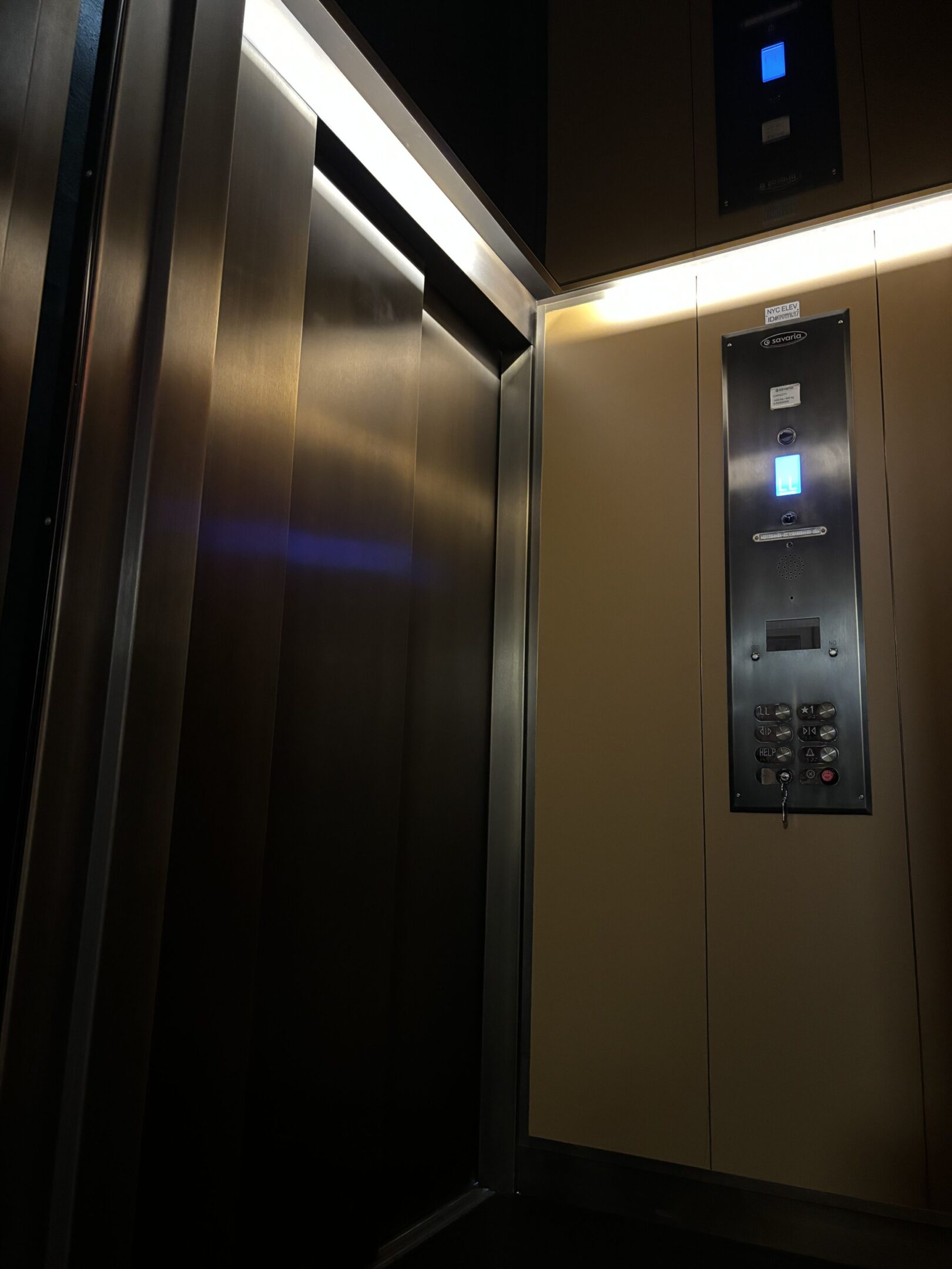 Bronze Glass Elevator Cab Renovation in SoHo — view 4