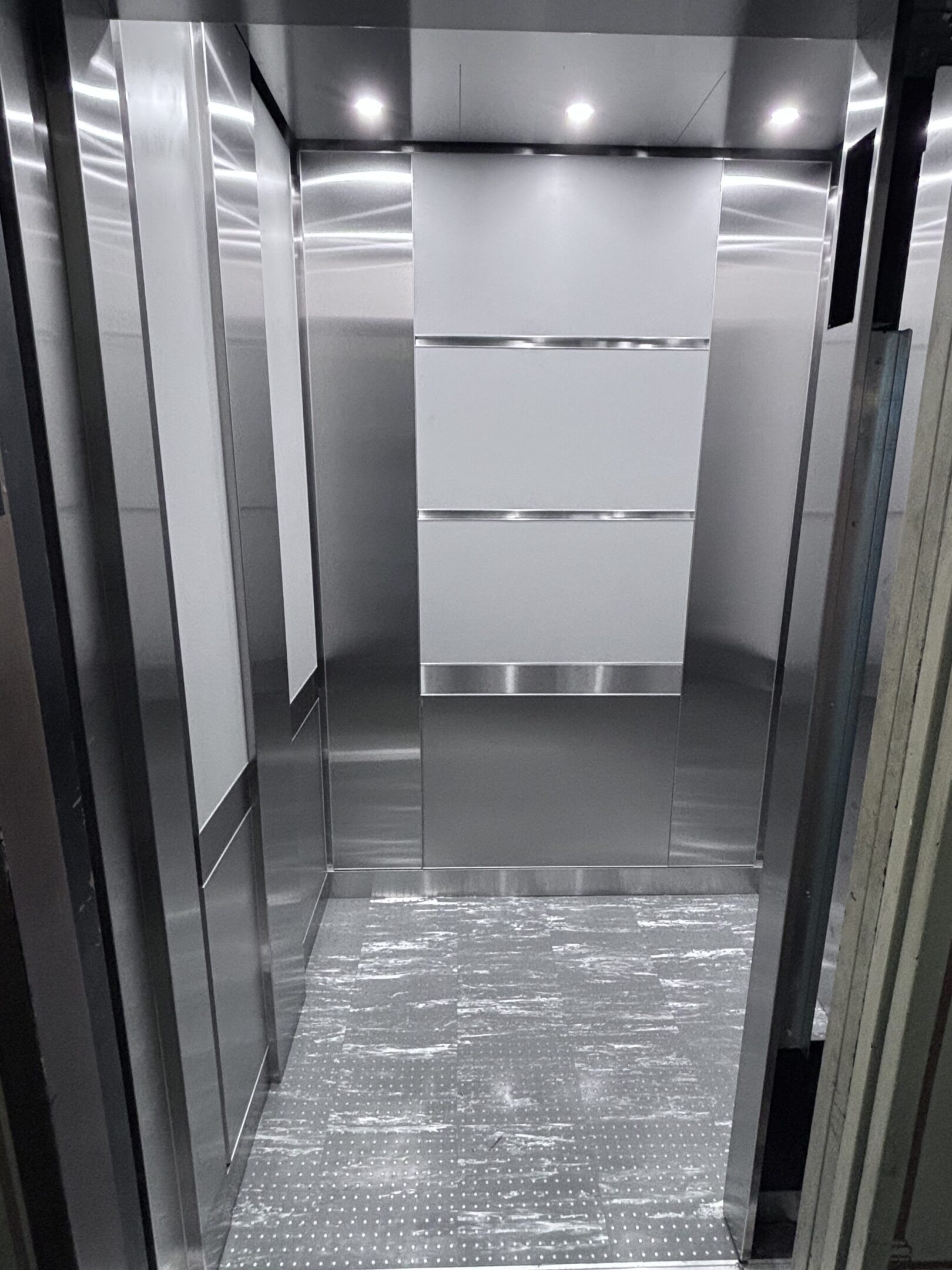 Dove Grey & Stainless Elevator Cab — Chelsea — 150 West 22nd Street · Chelsea, Manhattan